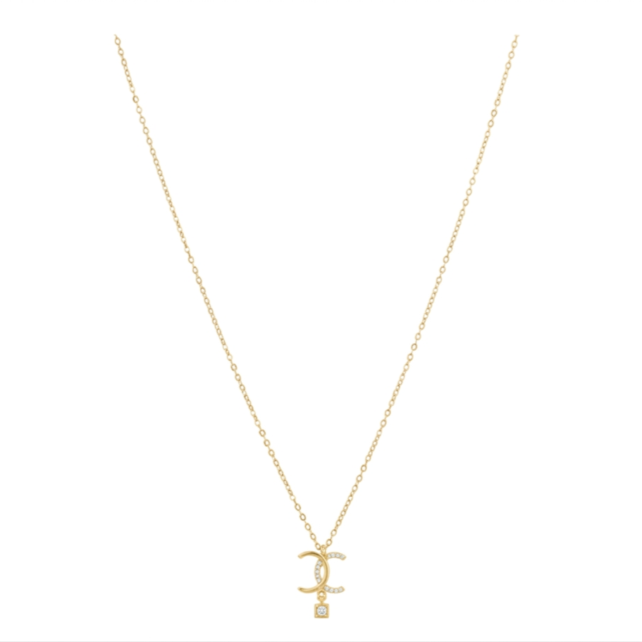 Twin curve gold plated silver pendant worn by model stylish look